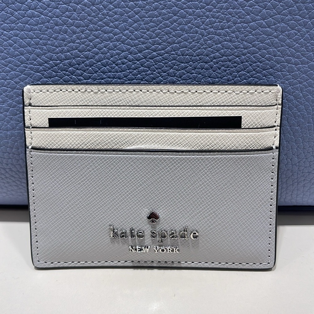 Kate Spade Madison Small Slim Card Holder
Platinum Grey Multi
NWT - Picture 8 of 16